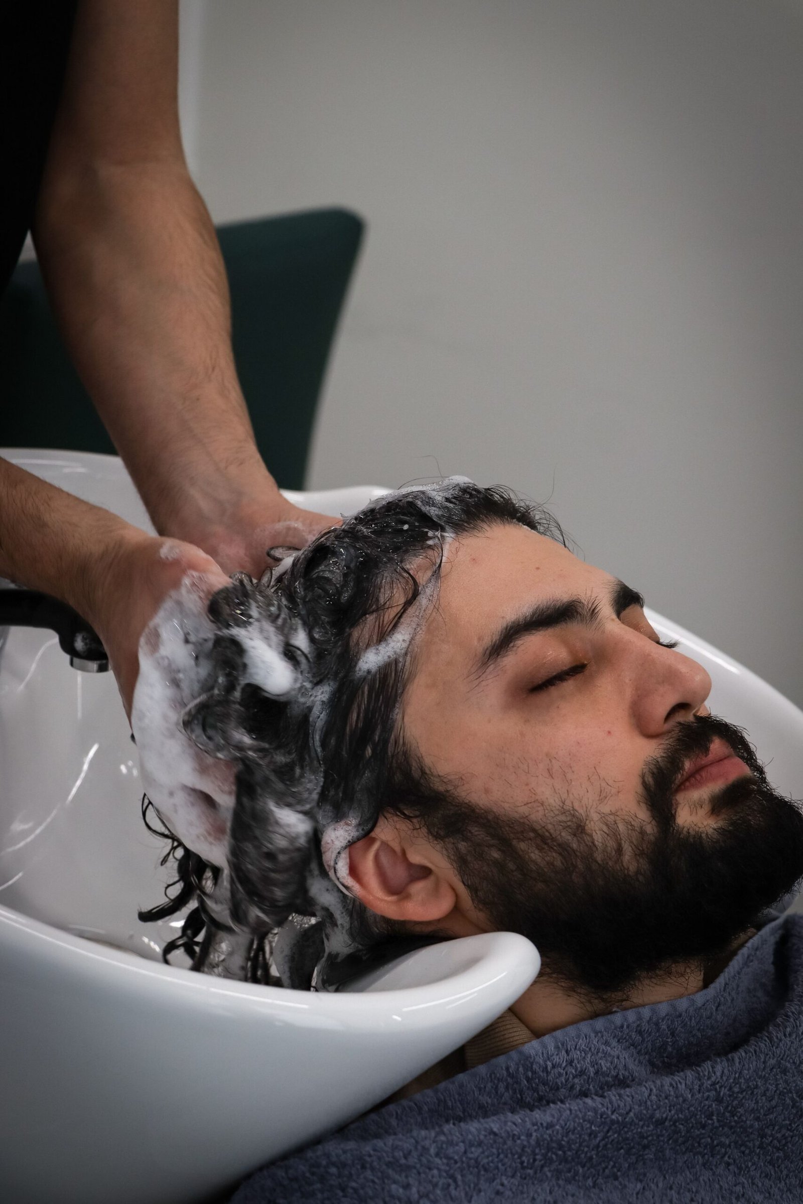 Scalp massager doing hair wash